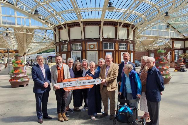 Broadcaster and historian Tim Dunn, Tracy Stevenson, community relations for ScotRail, Ronnie Cowan, SNP MP for Inverclyde, Stuart McMillan SNP MSP for Greenock and Inverclyde, and Friends of Wemyss Bay station <i>(Image: Rail Development Group)</i>