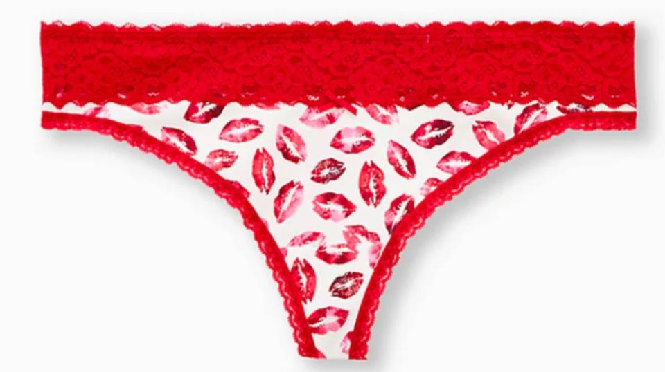 Perfect for when you really want to tell someone to kiss your...<br /><br /><strong>Get it from Torrid for <a href="https://www.torrid.com/product/white-red-lips-wide-lace-cotton-thong-panty-/14247042.html" target="_blank" rel="noopener noreferrer">$12.50</a> (available in sizes M&ndash;6XL).</strong>