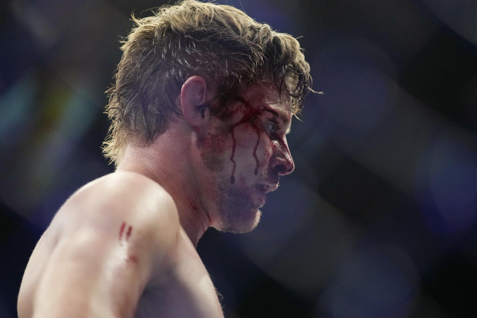 Bryce Mitchell reacts after losing to Ilia Topuria during a UFC 282 mixed martial arts featherweight bout Saturday, Dec. 10, 2022, in Las Vegas. (AP Photo/John Locher)
