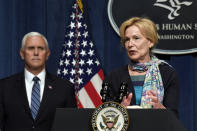 Vice President Mike Pence, left, listens as Dr. Deborah Birx, White House coronavirus response coordinator, right, speaks during a news conference with members of the Coronavirus task force at the Department of Health and Human Services in Washington, Friday, June 26, 2020. (AP Photo/Susan Walsh)