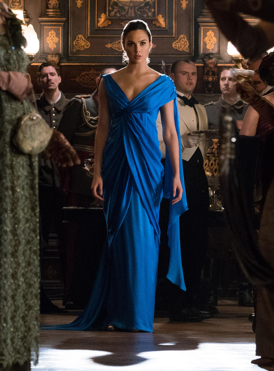 <p>Diana certainly knows how to make an entrance to a gala. (Photo: Warner Bros.)<br> </p>  <p>Dance of Doom</p><p> Diana has her sword handy as she looks for an opportunity to strike down the general. (Photo: Warner Bros.)<br> </p>  <p>Reinforcements</p><p> Chief, Charlie, Sameer, and Steve follow Wonder Woman into battle. (Photo: Warner Bros.)<br> </p>  <p>The Team</p><p> Sameer, Steve, Wonder Woman, Chief, and Charlie strike a post-battle pose. The resulting photo will be unearthed decades later by Lex Luthor (in <em>Batman v Superman</em>) and eventually returned to Diana by Bruce Wayne. (Photo: Warner Bros.)<br> </p>