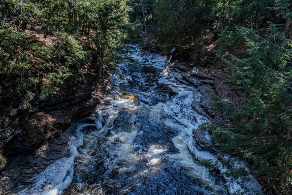 The Presque Isle River, which feeds Lake Superior in Michigan's Upper Peninsula, is one of the many sites that brings people to Porcupine Mountain Wilderness State Forest and makes it a thriving spot for outdoor recreation.