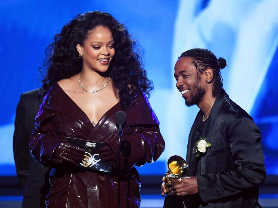  Recording artists Rihanna (L) and Kendrick Lamar accept Best Rap:Sung Performance for 'Loyalty' onstage during the 60th Annual GRAMMY Awards at Madison Square Garden on January 28, 2018 in New York City