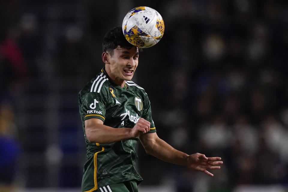 Portland Timbers midfielder Noel Caliskan heads the ball during the first half of the team's MLS soccer match against the LA Galaxy, Saturday, Sept. 30, 2023, in Carson, Calif. (AP Photo/Ryan Sun)
