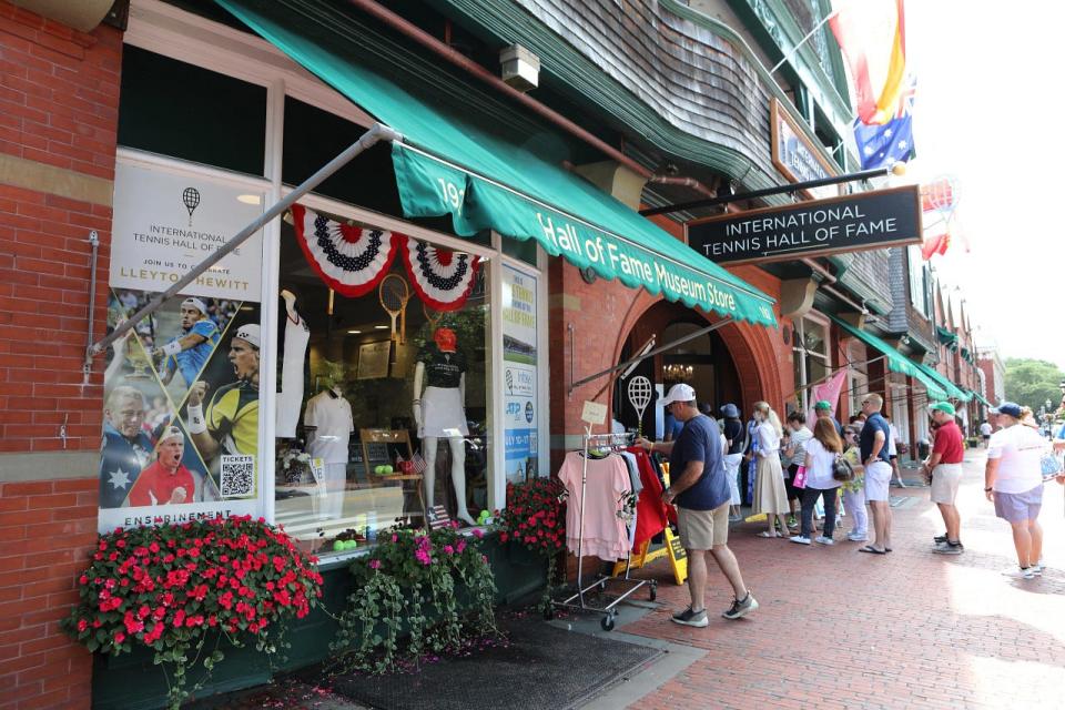 Fans make their way into the International Tennis Hall of Fame for the Infosys Open on Sunday in Newport.