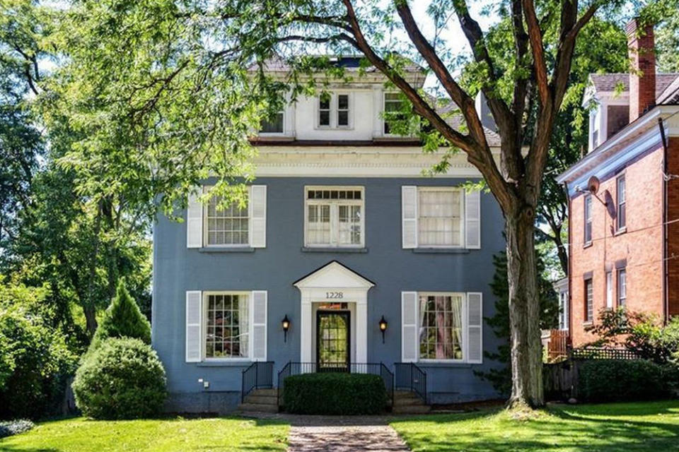 architecture styles blue house white shutters