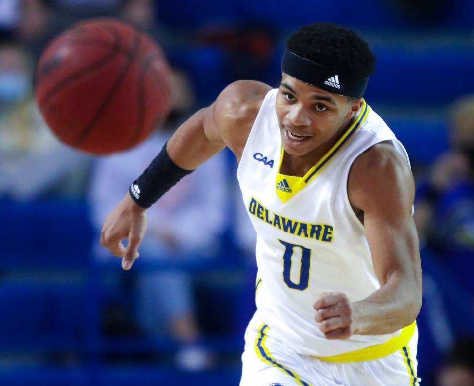 Delaware's Jameer Nelson, Jr. chases a loose ball in the first half of Delaware's 99-96 loss at the Bob Carpenter Center, Thursday, Feb. 24, 2022.