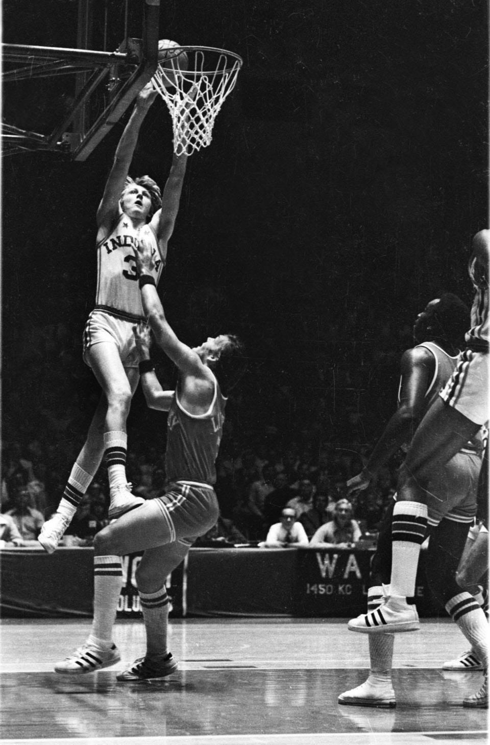 Springs Valley's Larry Bird goes up for a layup in the 1974 All-Stars game against Kentucky at Hinkle Fieldhouse.