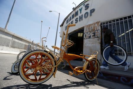 Customized low rider bicycles are pictured outside Manny's bike shop in Compton, California U.S., June 3, 2016. Picture taken June 3, 2016. REUTERS/Mario Anzuoni