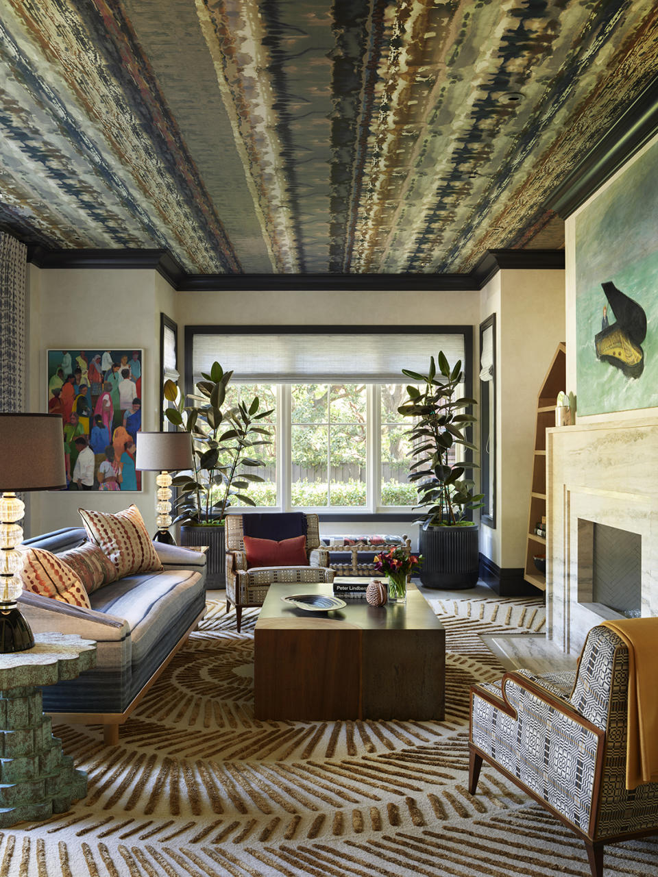 Dark living room with patterned wallpaper on the ceiling