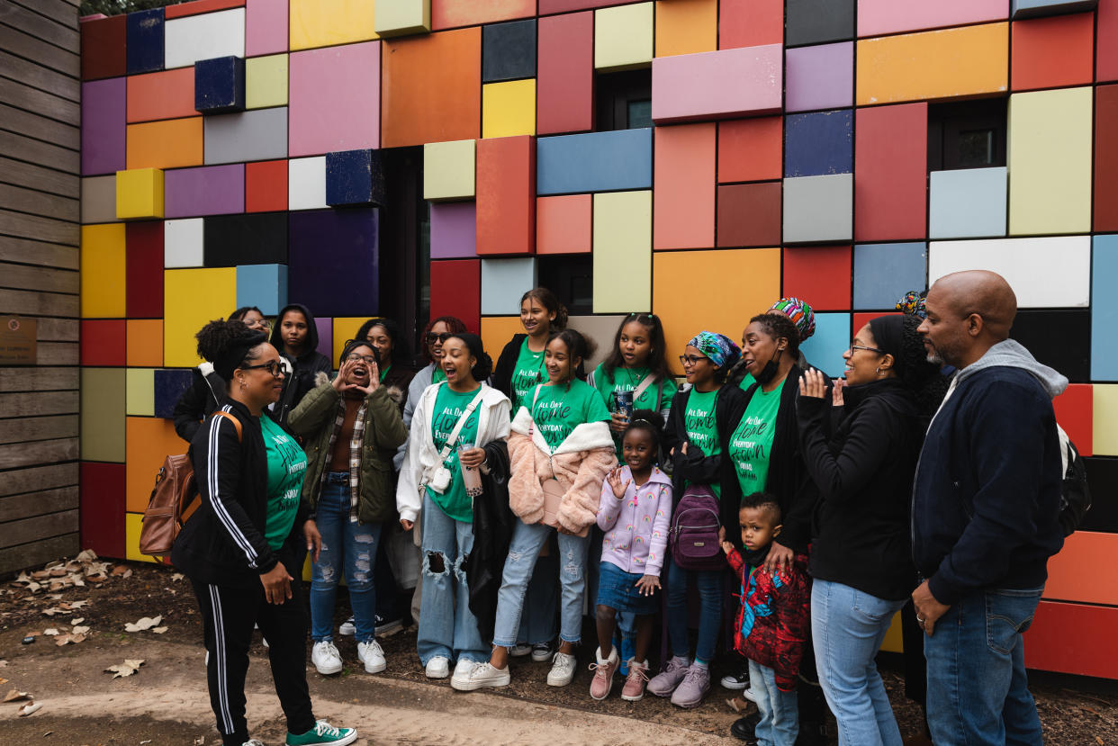 Home Grown Homeschoolers Inc. co-op founder Tralandra Stewart, left, leads members in a chant in Discovery Green Park in Houston, Texas at the end of field trip day on Jan. 27, 2023. (Jacque Jackson for NBC News)