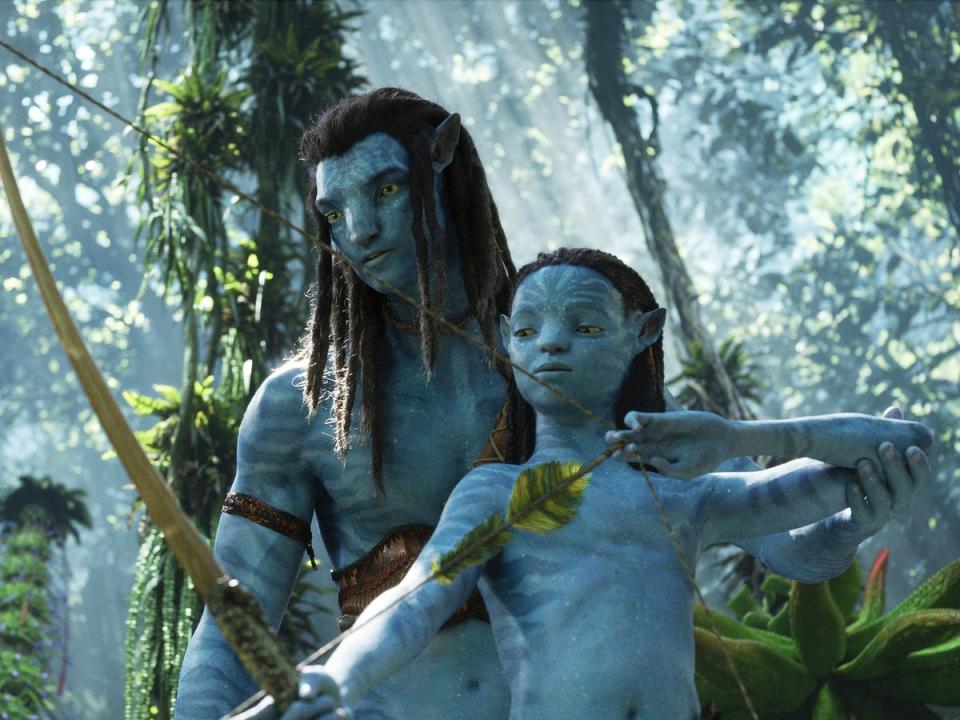 Sam Worthington’s Jake Sully with one of his sons in the long awaited ‘Avatar: The Way of Water' (Disney)