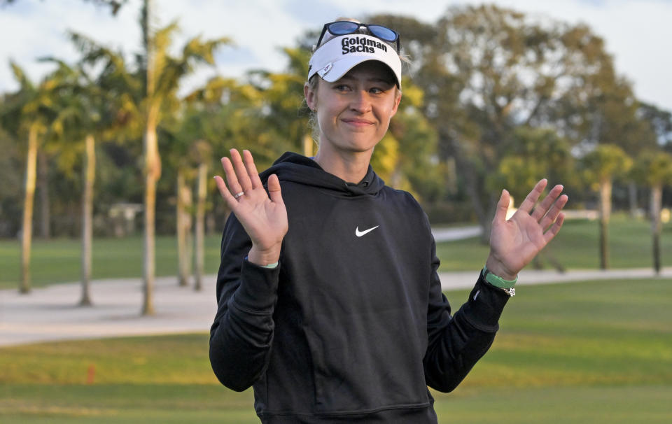 Nelly Korda waves to hometown fans after winning the LPGA Drive On Championship golf tournament at Bradenton Country Club, Sunday, Jan. 28, 2024, in Bradenton, Fla. (AP Photo/Steve Nesius)