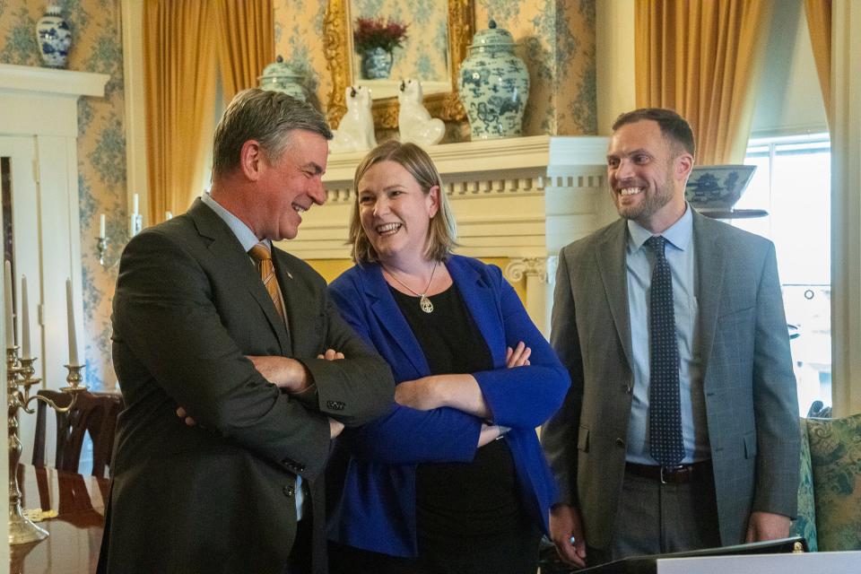 (L-R) Athens Mayor Steve Patterson, former Dayton mayor and gubernatorial candidate Nan Whaley, and Chillicothe Mayor Luke Feeney talk after a press conference at the historic Atwood House in downtown Chillicothe on Wednesday, March 23, 2022.