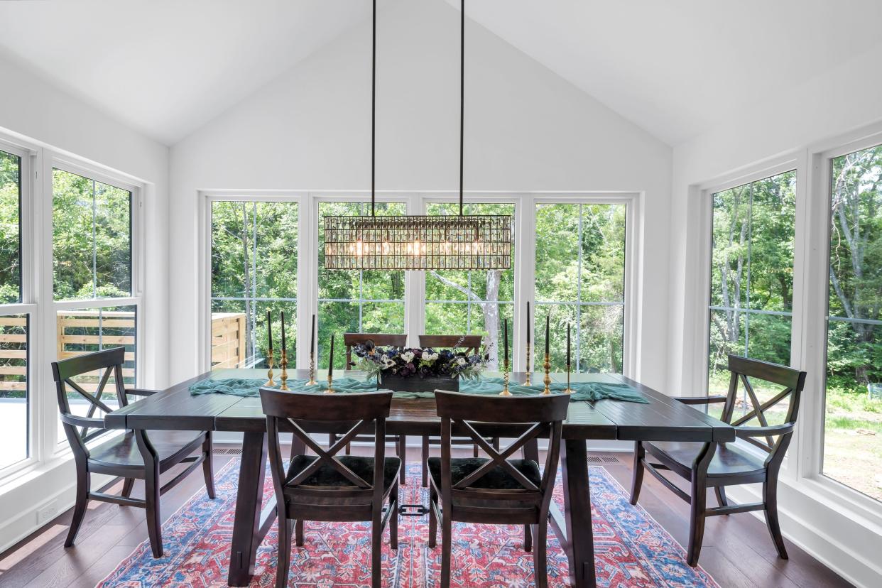 Rather than a formal dining room, the homeowners opted for an elevated version of an eat-in kitchen in this modern farmhouse-style home built by the Eldridge Company in Louisville.