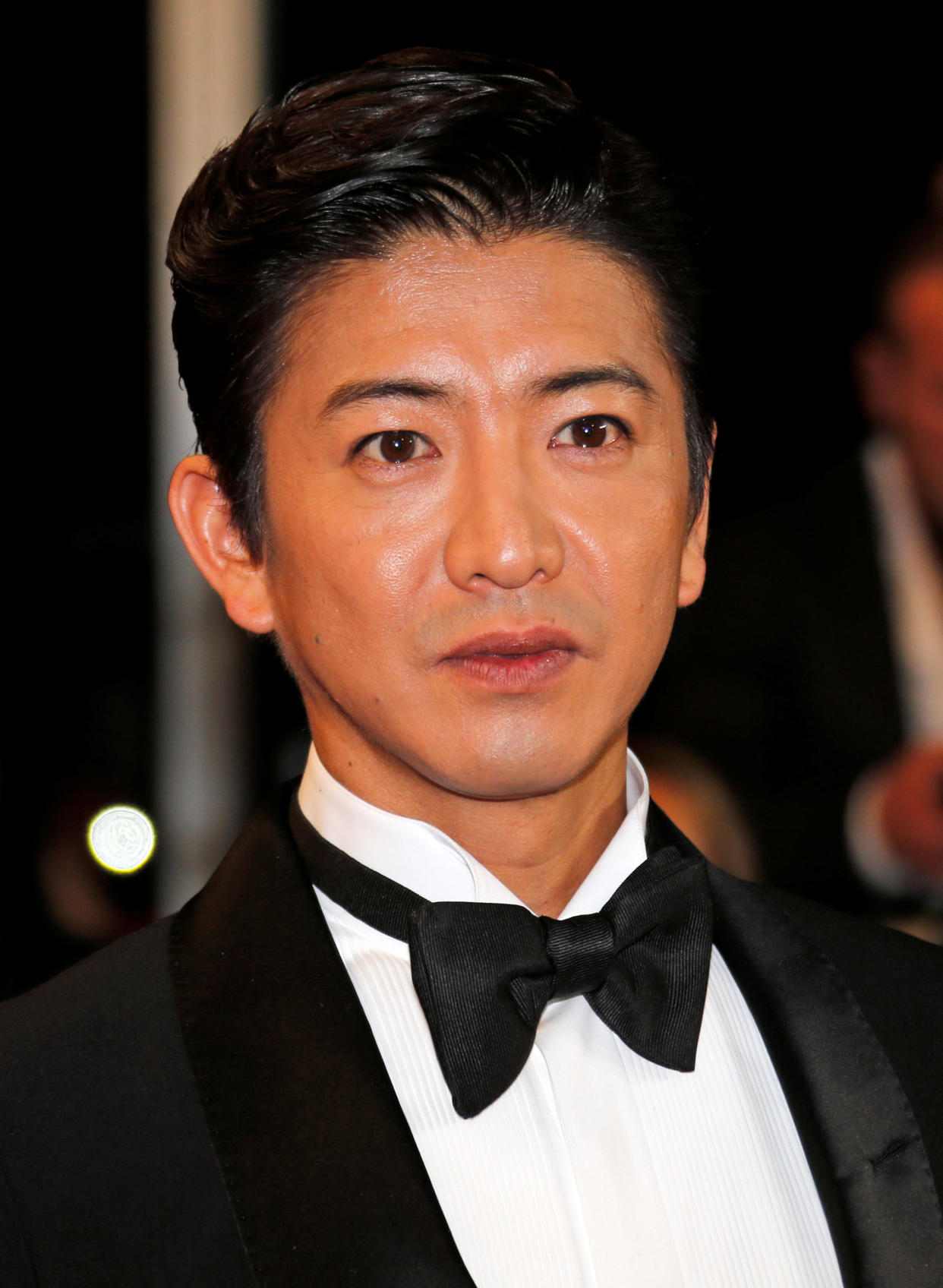 70th Cannes Film Festival - Screening of the film "Mugen no junin" (Blade of the Immortal) out of competition - Red Carpet Arrivals - Cannes, France. 18/05/2017. Cast memberTakuya Kimura poses. REUTERS/Jean-Paul Pelissier