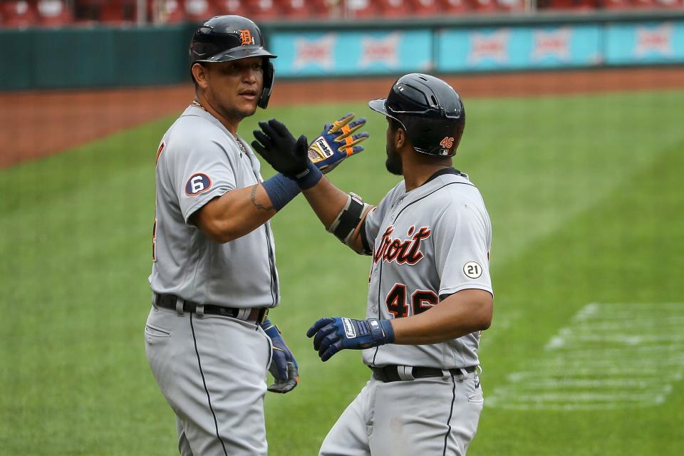 Tigers designated hitter Miguel Cabrera, left, congratulates first baseman Jeimer Candelario after Candelario hit a two-run home run during the fourth inning of the Tigers' 12-2 loss in the first game of a doubleheader on Thursday, Sept. 10, 2020, in St. Louis.