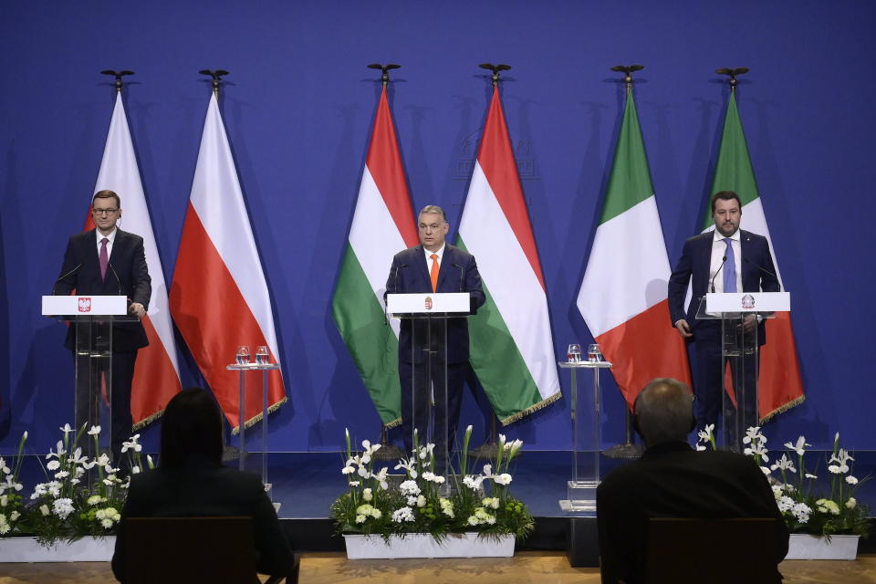 From left, Polish Prime Minister Mateusz Morawiecki, Hungarian Prime Minister Viktor Orban and Leader of Italian right-wing ruling party Lega, Matteo Salvini, attend a joint press conference after their trilateral meeting focused on creating a European-level alliance between Hungary's ruling Fidesz, Italy's Lega and Poland's PiS party at the PM's office in the Castle of Buda, in Budapest, Hungary, Thursday, April 1, 2021. (Szilard Koszticsak/MTI via AP)