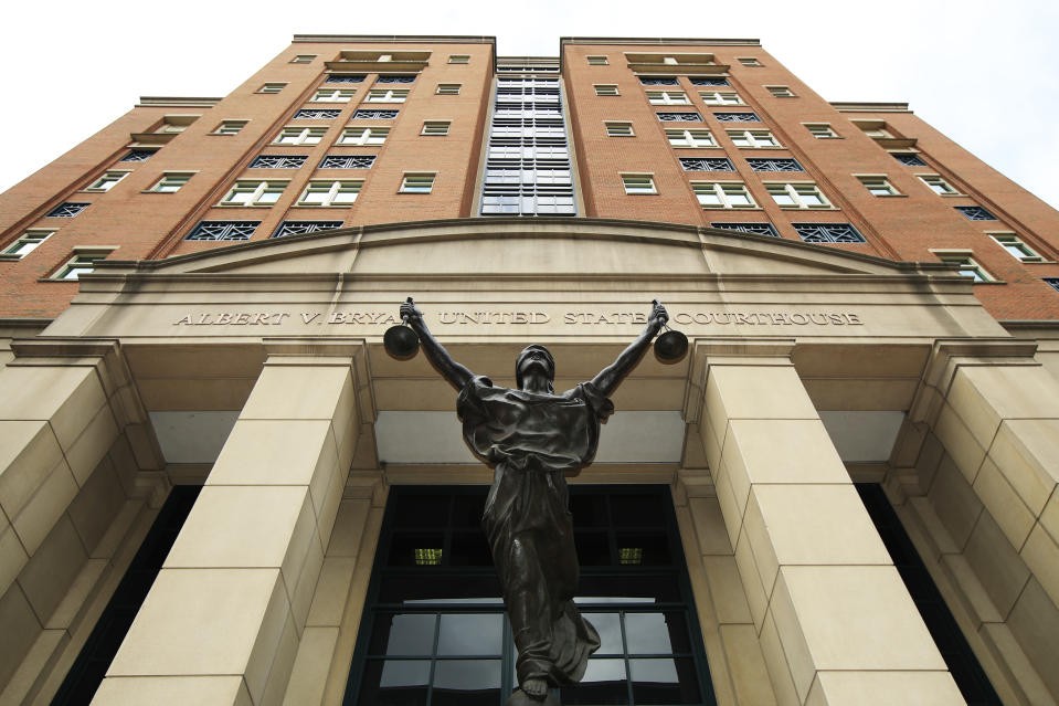 A statue adorns the front of the Albert V. Bryan United States Courthouse, Thursday, Aug. 2, 2018 in Alexandria, Va., where President Donald Trump's former campaign chairman Paul Manafort is on trial facing federal charges of tax evasion and bank fraud. (AP Photo/Manuel Balce Ceneta)