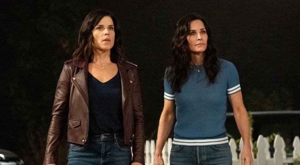 Neve Campbell (left) and Courteney Cox star in horror film "Scream."