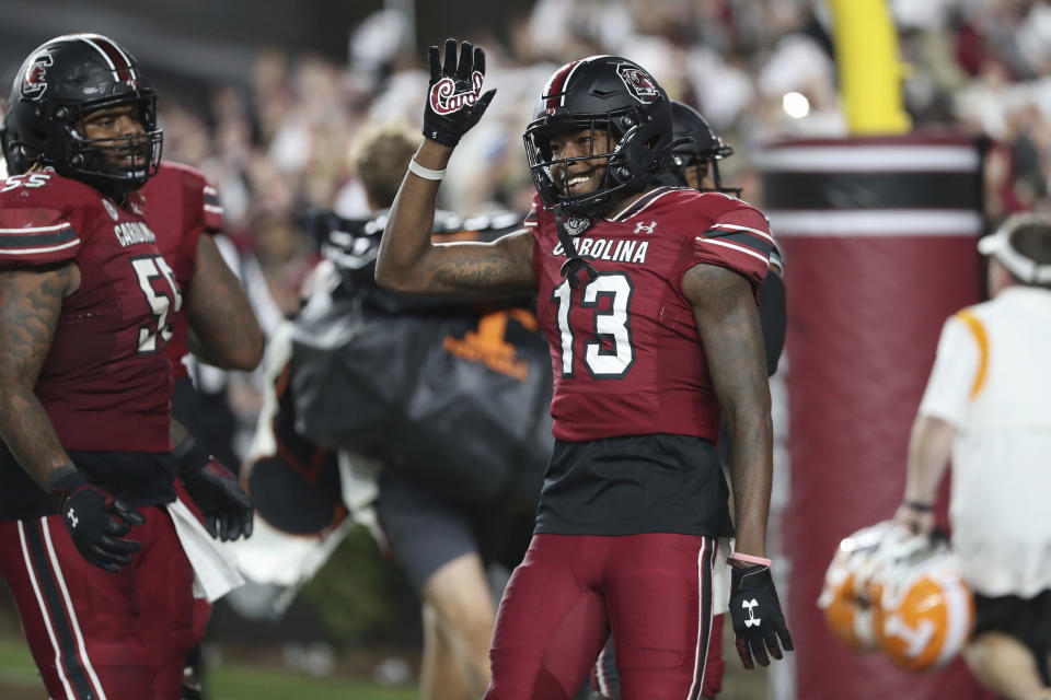 South Carolina wide receiver Jalen Brooks (13) waves goodbye to the Tennessee sideline after scoring a touchdown on Saturday, Nov. 19, 2022, in Columbia, S.C. (AP Photo/Artie Walker Jr.)