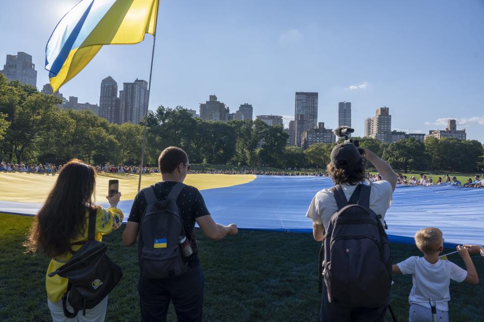 A giant Ukrainian flag is unfurled in Central Park, New York City. (Ron Adar/Shutterstock)