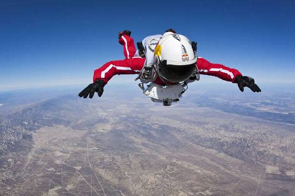 Pilot Felix Baumgartner of Austria performs during the first high altitude test jump from an airplane for the Red Bull Stratos mission in Taft, Calif., on Feb. 20 2012.
