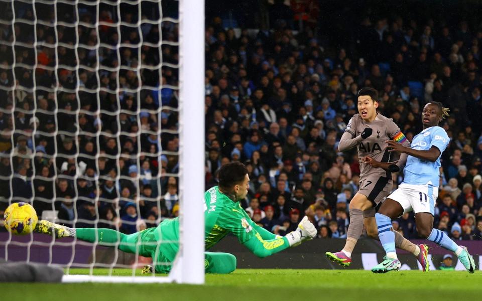 Tottenham Hotspur's Son Heung-min scores their first goal past Manchester City's Ederson