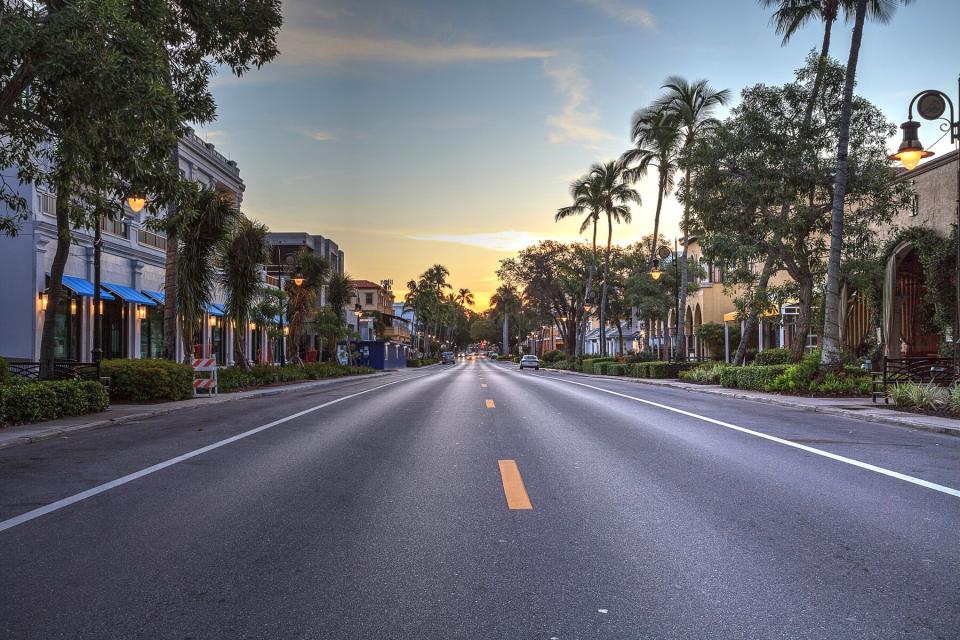 Daybreak Over The Shops Along 5th Street In Old Naples, Florida.