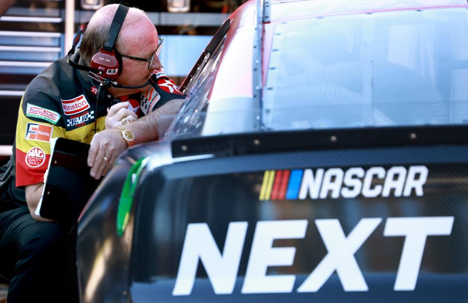 Larry McReynolds talks with driver Clint Bowyer during a testing session for the NASCAR Next Gen car at Bowman Gray Stadium in October of 2021.