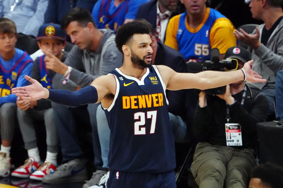 Game 2: Denver Nuggets guard Jamal Murray reacts in the first quarter against the Miami Heat.