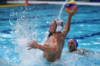 United States' Hannes Daube (5) shoots against Italy during a preliminary round men's water polo match at the 2020 Summer Olympics, Thursday, July 29, 2021, in Tokyo, Japan. (AP Photo/Mark Humphrey)