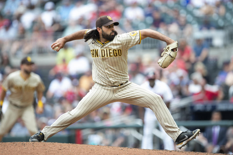 San Diego Padres relief pitcher Nabil Crismatt throws during the 11th inning of a baseball game against Atlanta Braves, Sunday, May 15, 2022, in Atlanta. (AP Photo/Hakim Wright Sr)