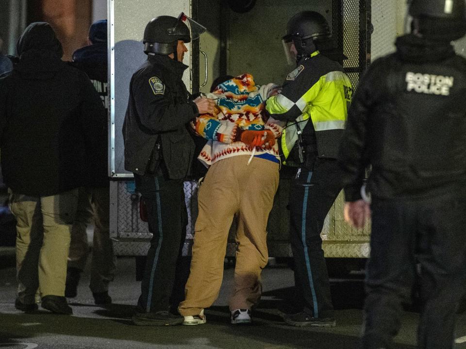 Police arrest pro-Palestinian demonstrators as the Emerson College Palestinian protest camp is cleared in Boston (AFP via Getty Images)