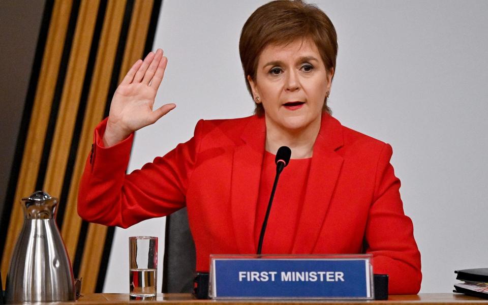 First Minister Nicola Sturgeon taking oath before giving evidence to the Committee on the Scottish Government Handling of Harassment Complaints, at Holyrood - PA