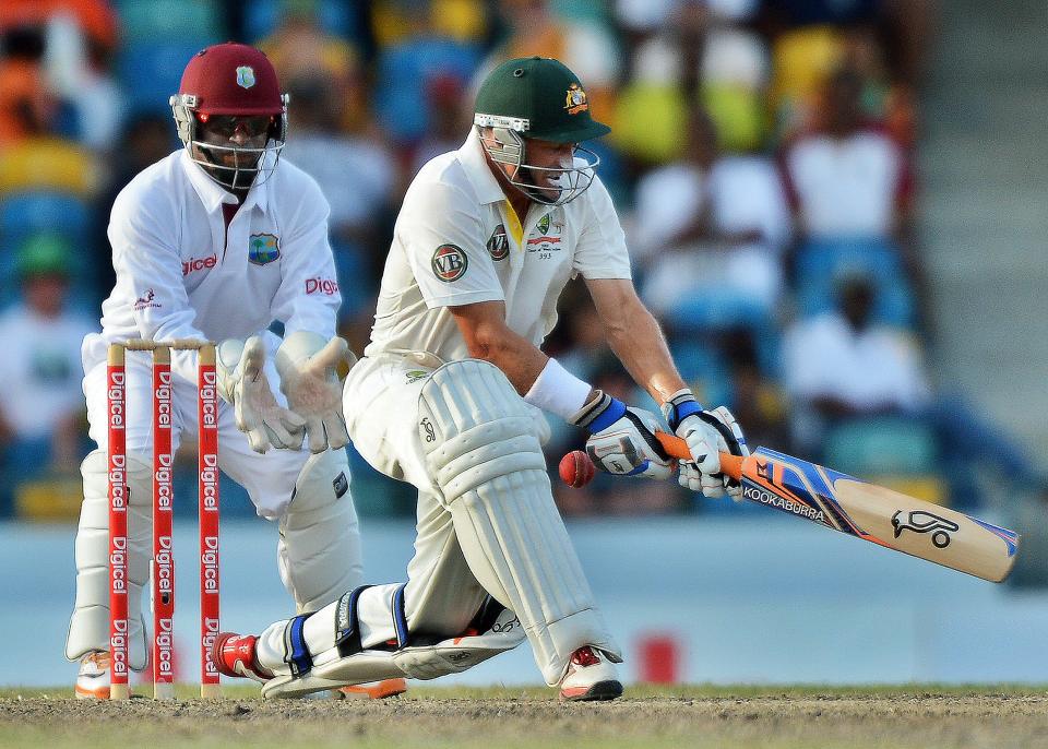 Australian batsman Michael Hussey plays