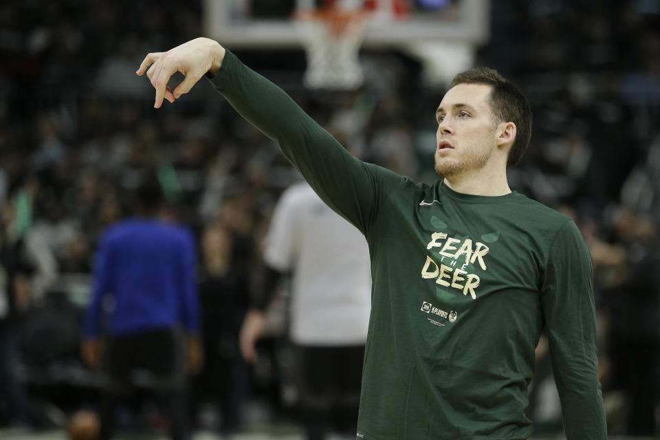 Milwaukee Bucks' Pat Connaughton warms up before the second half of Game 1 of an NBA basketball first-round playoff series against the Detroit Pistons Sunday, April 14, 2019, in Milwaukee. The Bucks won 121-86 (AP Photo/Aaron Gash)