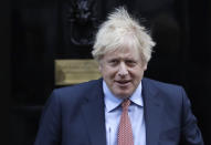 Britain's Prime Minister Boris Johnson leaves 10 Downing Street to attend the weekly session of Prime Ministers Questions in Parliament in London, Wednesday, Jan. 29, 2020. Britain officially leaves the European Union on Friday after a debilitating political period that has bitterly divided the nation since the 2016 Brexit referendum. (AP Photo/Kirsty Wigglesworth)