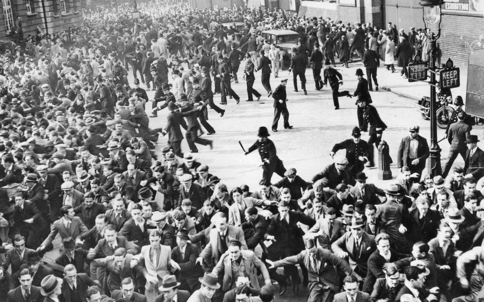 Riots between anti-fascists and blackshirts during the Battle of Cable Street