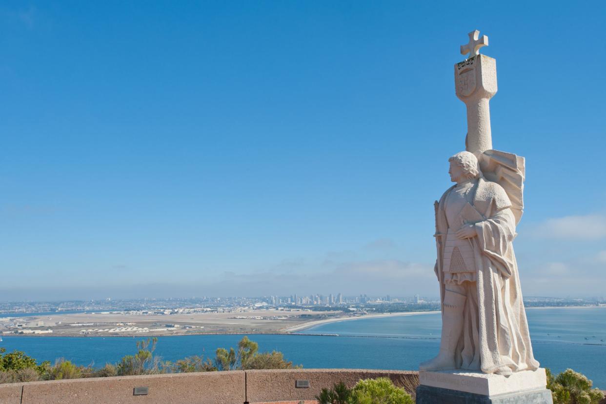 Juan Rodríguez Cabrillo statue and panorama of San Diego, California