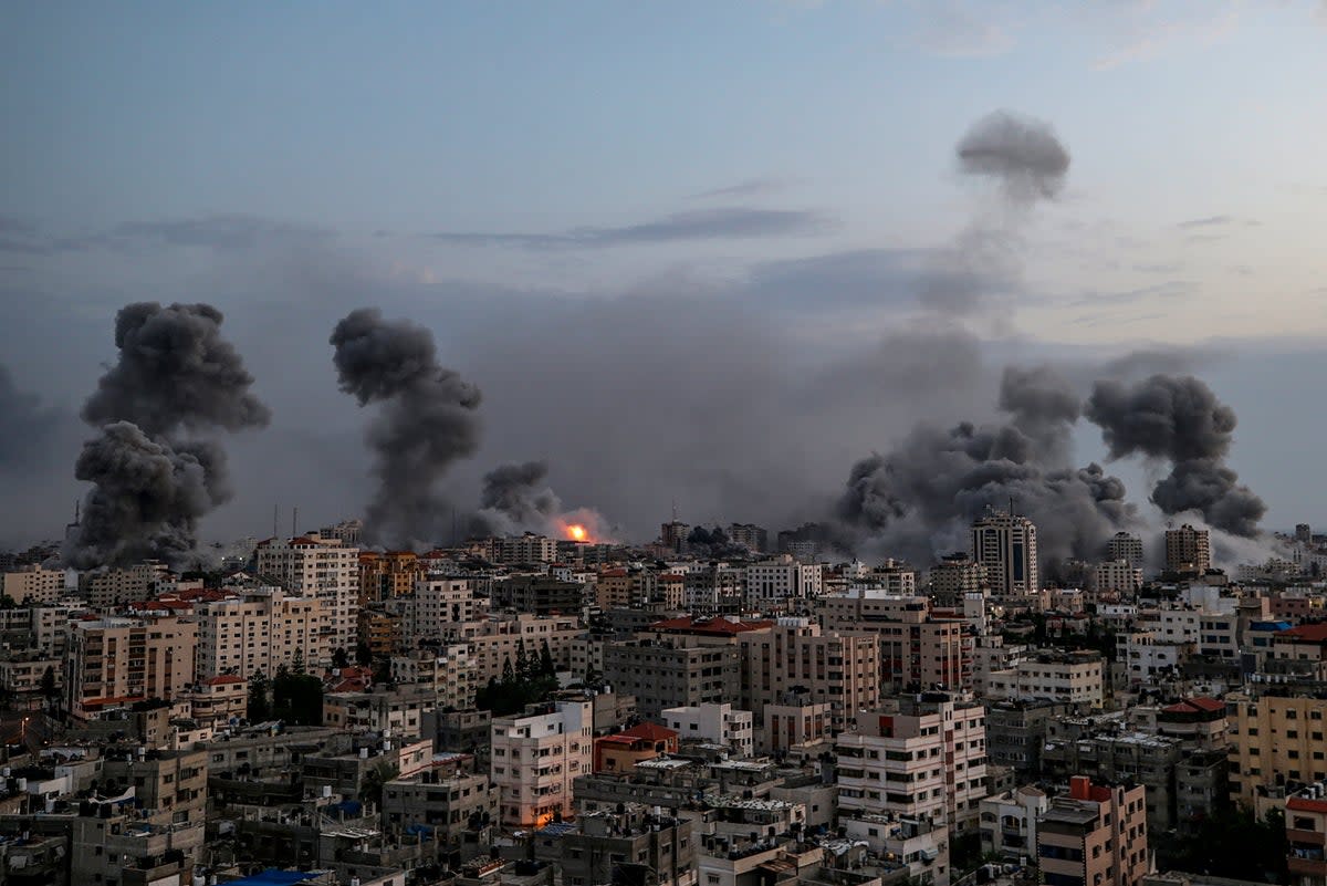 Smoke rises following an Israeli air strike on Gaza City (EPA)