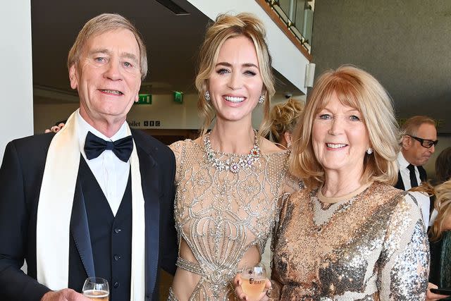 <p>Dave Benett/BAFTA/Getty</p> Emily Blunt with parents Oliver Blunt and Joanna Blunt