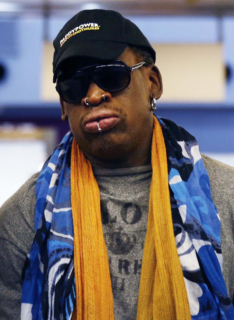 Former NBA basketball player Dennis Rodman is seen at Beijing International Airport December 19, 2013 before he leaves for Pyongyang. Rodman said on Thursday he was not going to North Korea to talk about politics or human rights, despite political tension surrounding the execution of leader Kim Jong Un's uncle. (REUTERS/Petar Kujundzic)