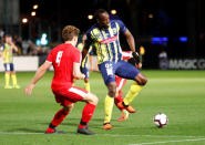 Soccer Football - Central Coast Mariners v Central Coast Select - Central Coast Stadium, Gosford, Australia - August 31, 2018 Central Coast Mariners' Usain Bolt in action with Central Coast Select's Jai McNamara REUTERS/David Gray