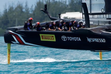 Sailing - America's Cup finals - Hamilton, Bermuda - June 26, 2017 - Peter Burling, Emirates Team New Zealand Helmsman (L) leads Oracle Team USA in race nine of America's Cup finals. REUTERS/Mike Segar