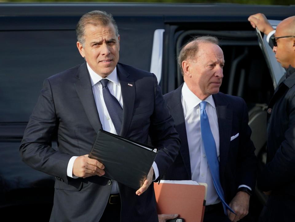 Hunter Biden, the son of President Joe Biden, with his attorney Abbe Lowell, right, arrive for a press conference outside the United States Capitol where Biden spoke to reporters and offered to publicly testify in House Republican's request on Dec. 13, 2023 in Washington, D.C.