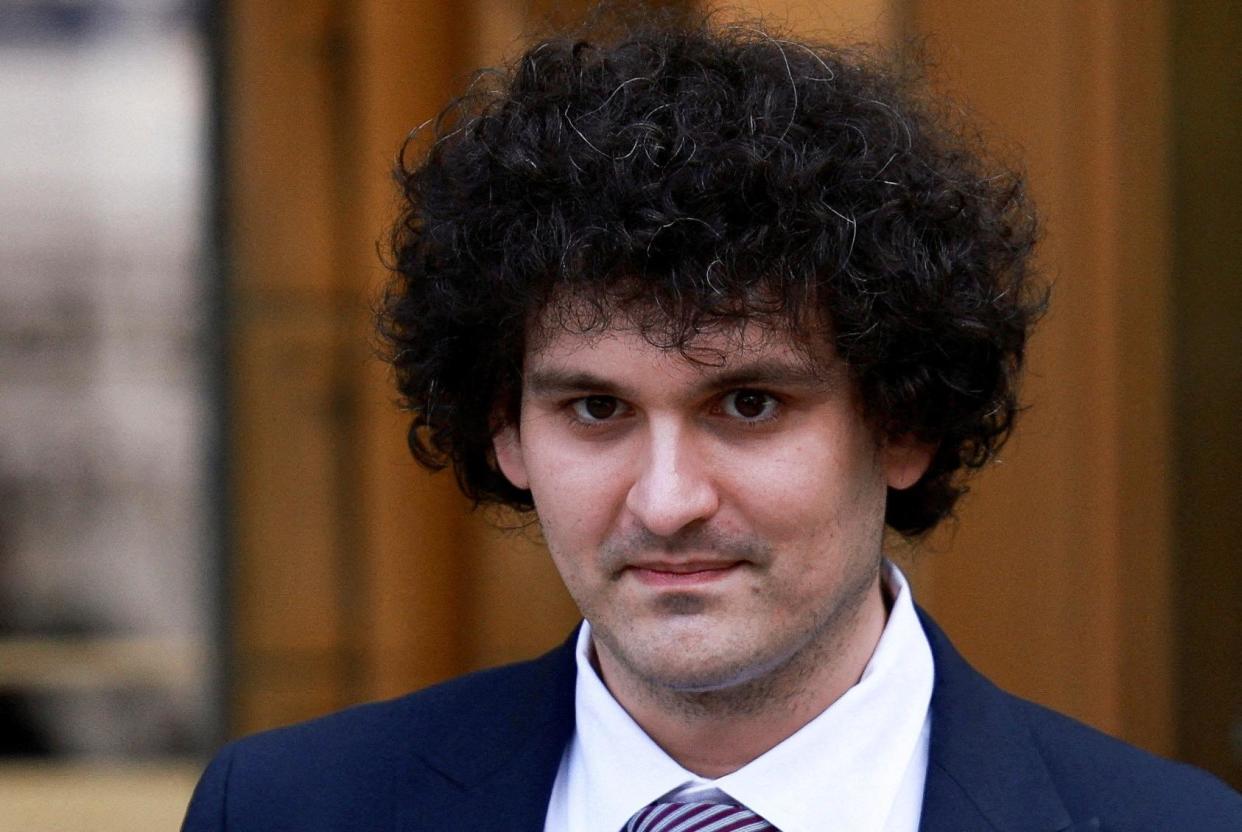 <span>Sam Bankman-Fried leaves court in New York on 26 July 2023.</span><span>Photograph: Amr Alfiky/Reuters</span>