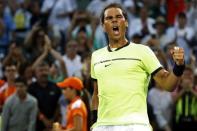 Mar 26, 2017; Miami, FL, USA; Rafael Nadal of Spain celebrates after his match against Philip Kohlschreiber of Germany (not pictured) on day six of the 2017 Miami Open at Crandon Park Tennis Center. Nadal won 0-6, 6-2, 6-3. Mandatory Credit: Geoff Burke-USA TODAY Sports