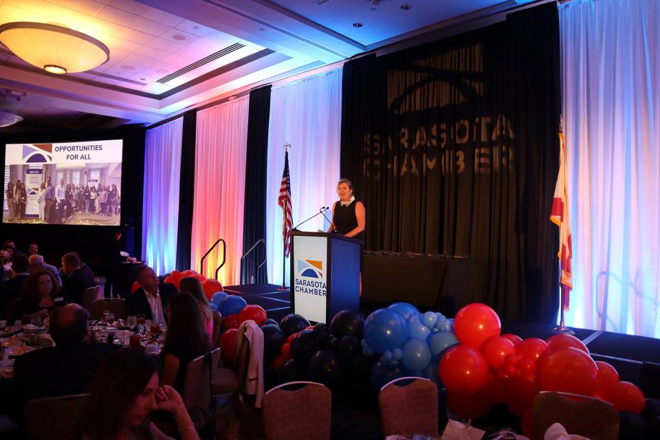Heather Kasten, president and CEO of the Greater Sarasota Chamber of Commerce, welcomes guests to the awards luncheon.