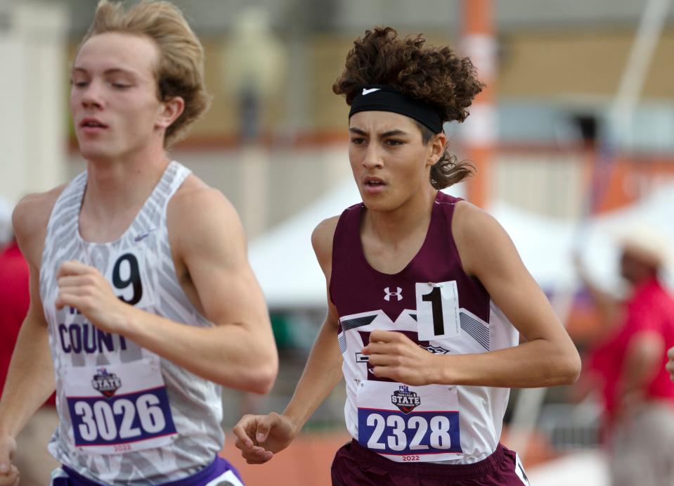 Mertzon Irion County's Tayte Cormier, left, and Booker's Adrian Rosales competes in the Class 1A 3200 meter run during the UIL State Track and Field meet, Saturday, May 14, 2022, at Mike A. Myers Stadium in Austin.